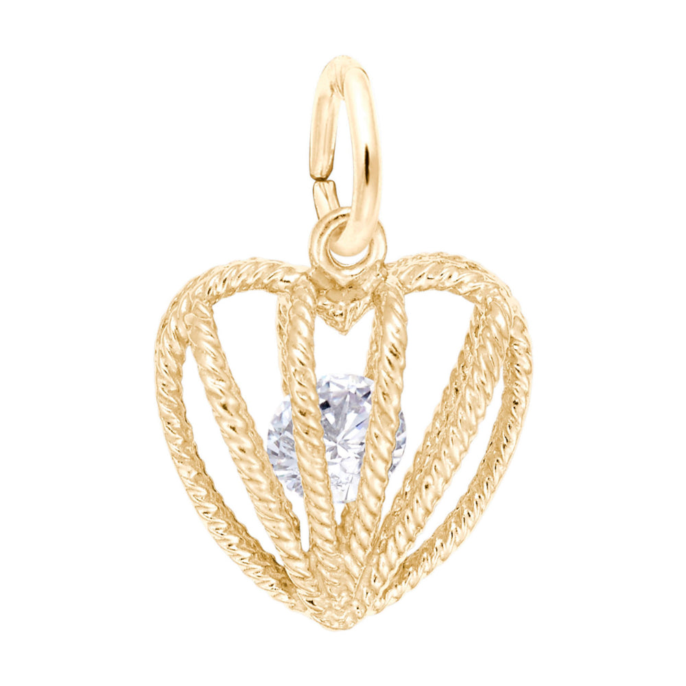 Gold heart-shaped pendant with a clear gemstone on a white background