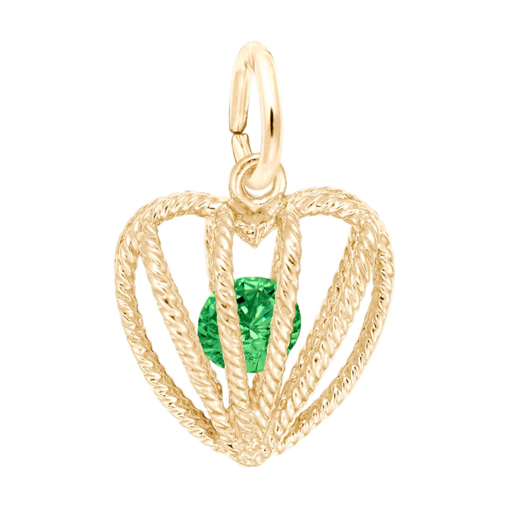 Gold heart-shaped pendant with a green gemstone on a white background