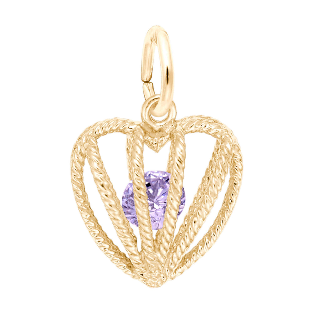 Gold heart-shaped pendant with a purple gemstone on a white background