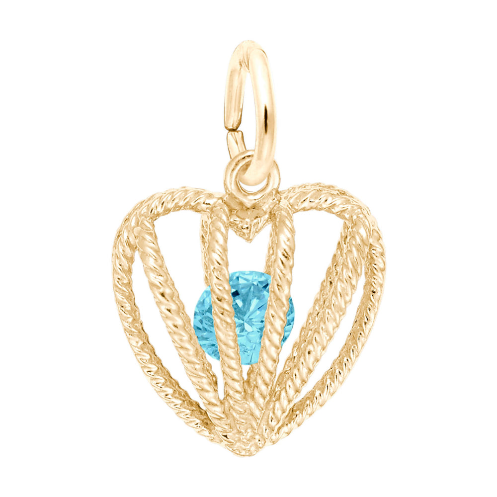 Gold heart-shaped pendant with a light blue gemstone on a white background