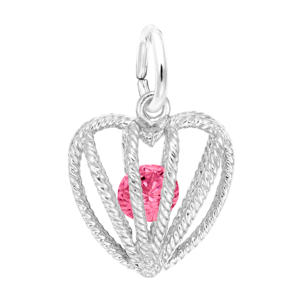 Silver heart-shaped pendant with a pink gemstone on a white background