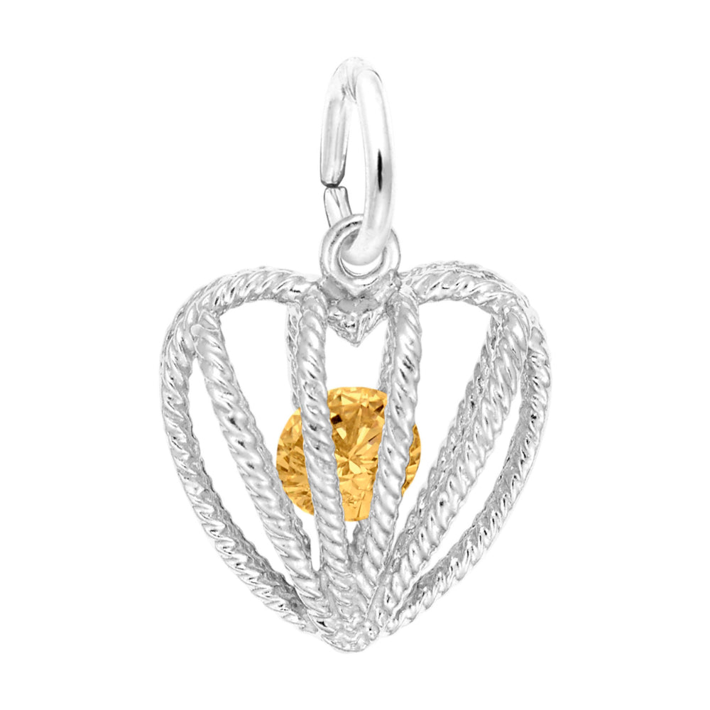 Silver heart-shaped pendant with an orange gemstone on a white background
