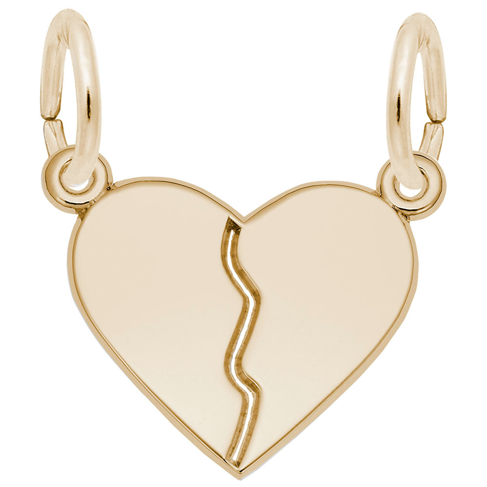 Gold heart-shaped break-apart charm with on a white background