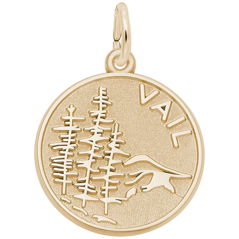 Gold charm with tree and mountain design and 'Vail' text on a white background