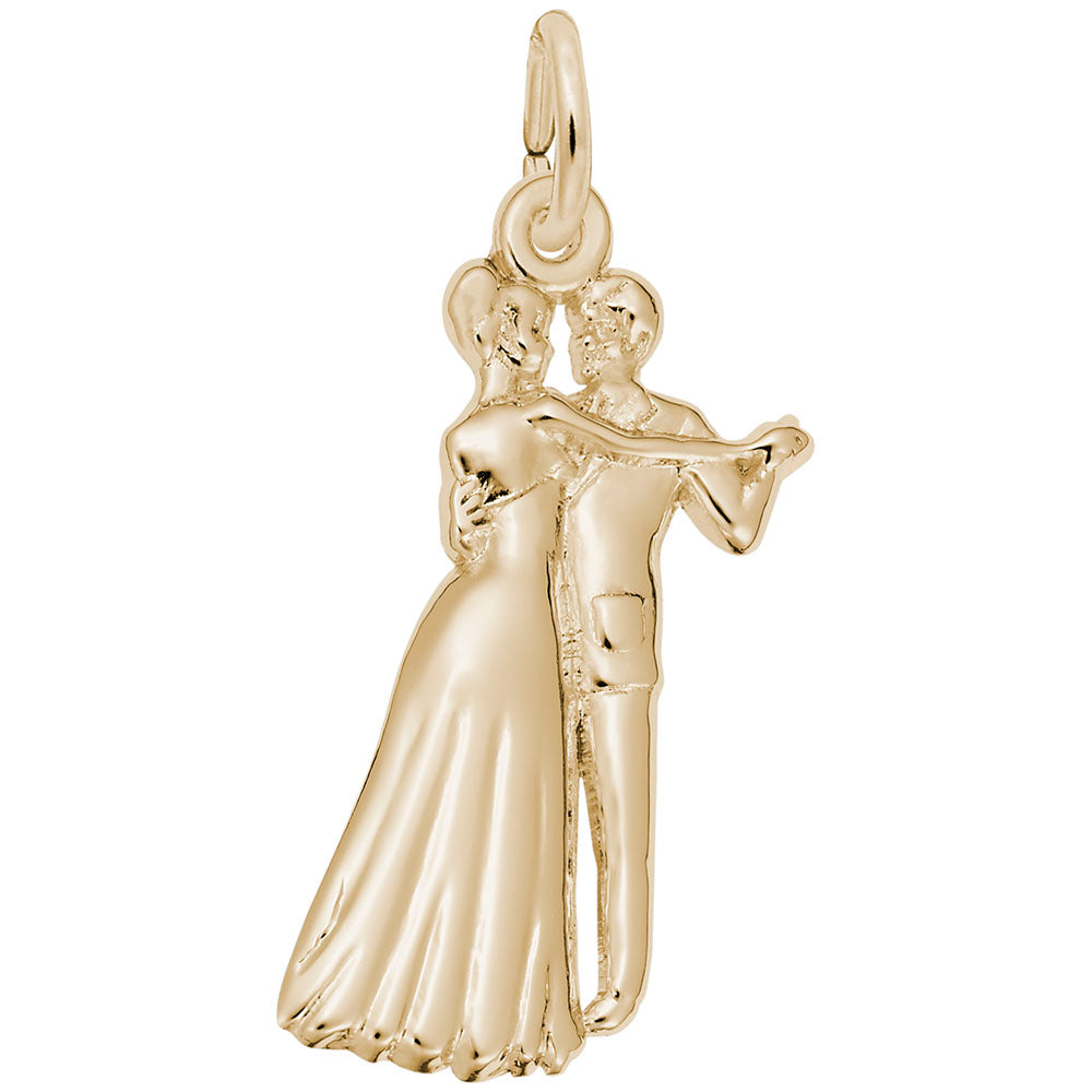 Gold charm of a couple dancing on a white background