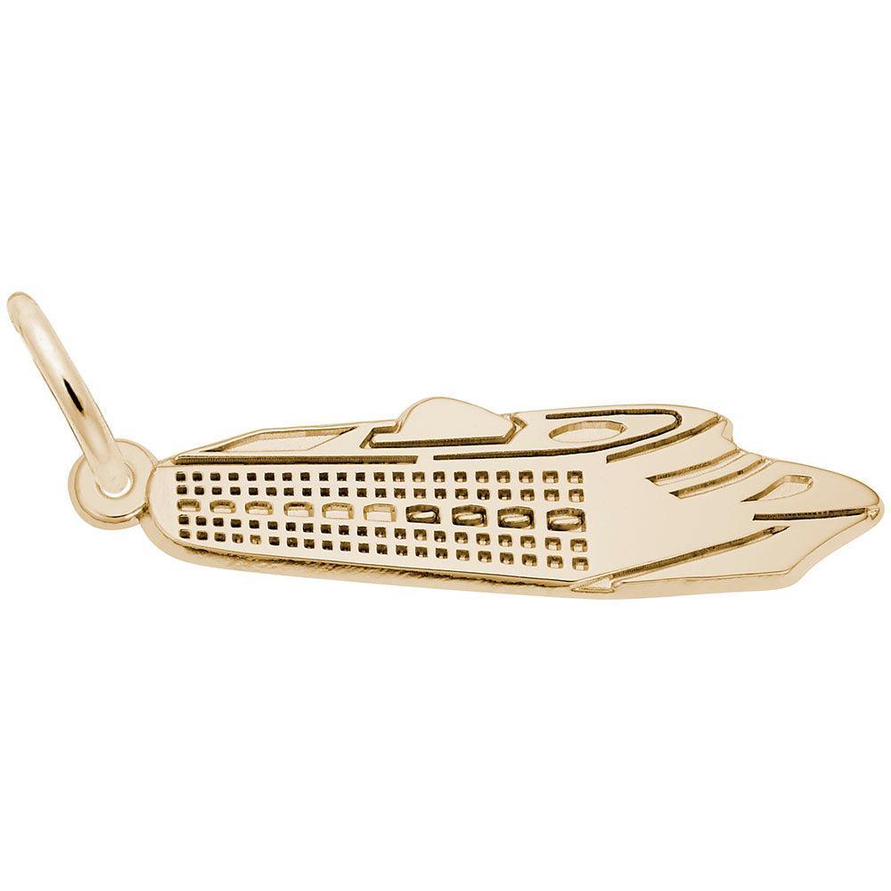Gold ship charm on a white background