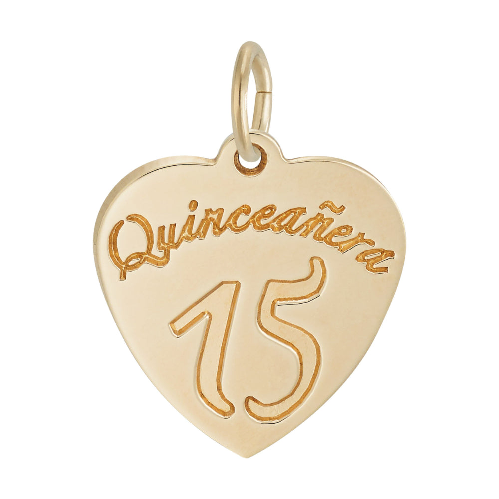 A gold heart-shaped pendant charm engraved with 'Quinceañera 15' on a plain white background.