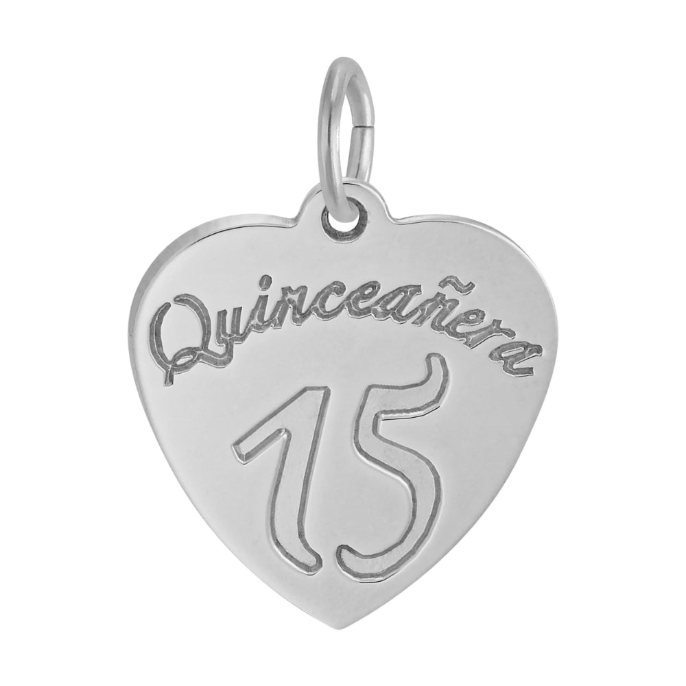 A silver heart-shaped pendant charm engraved with 'Quinceañera 15' and a top loop, shown on a plain white background.