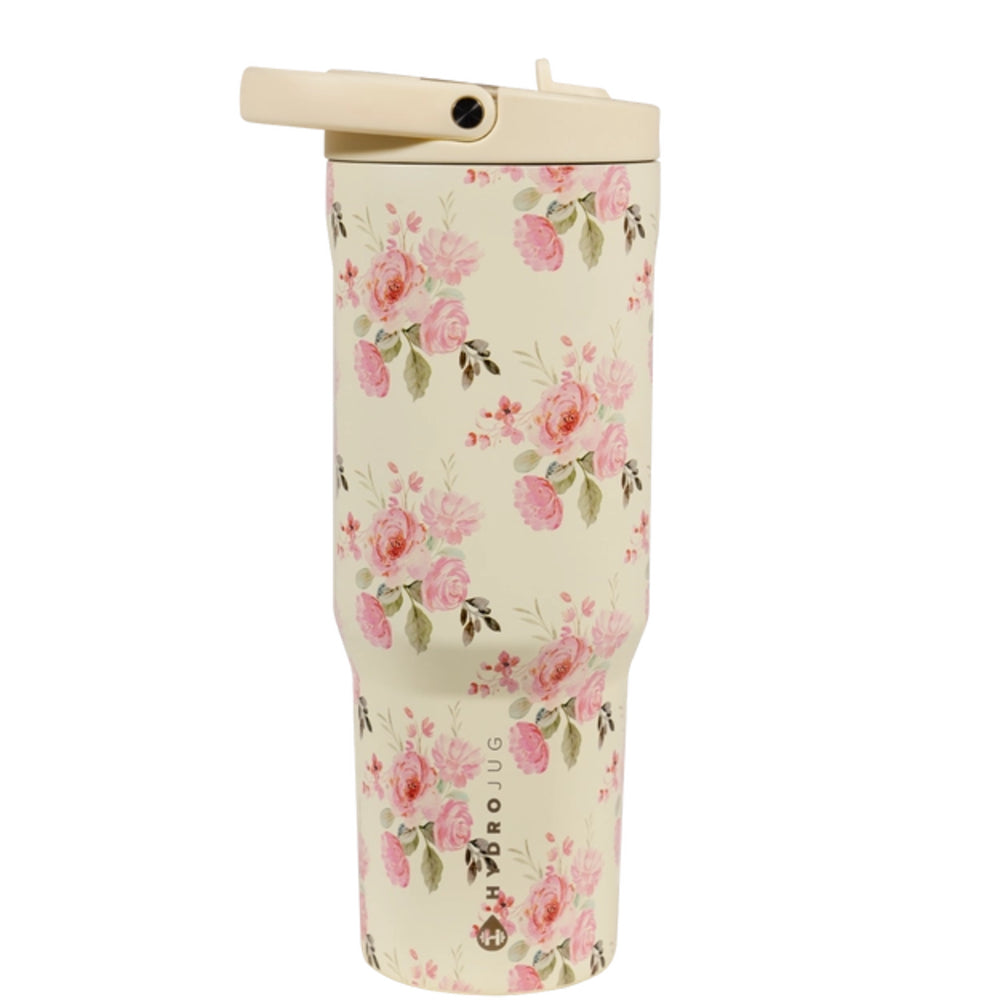 Floral-patterned tumbler with a beige lid on a white background.