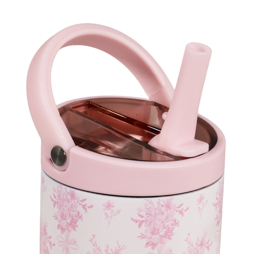 A photo showing the top of a pink tumbler with floral pattern, handle, and straw with a amber see.  through lid on a white background.