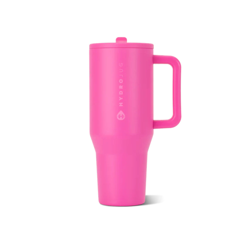 Pink tumbler with handle on a white background.