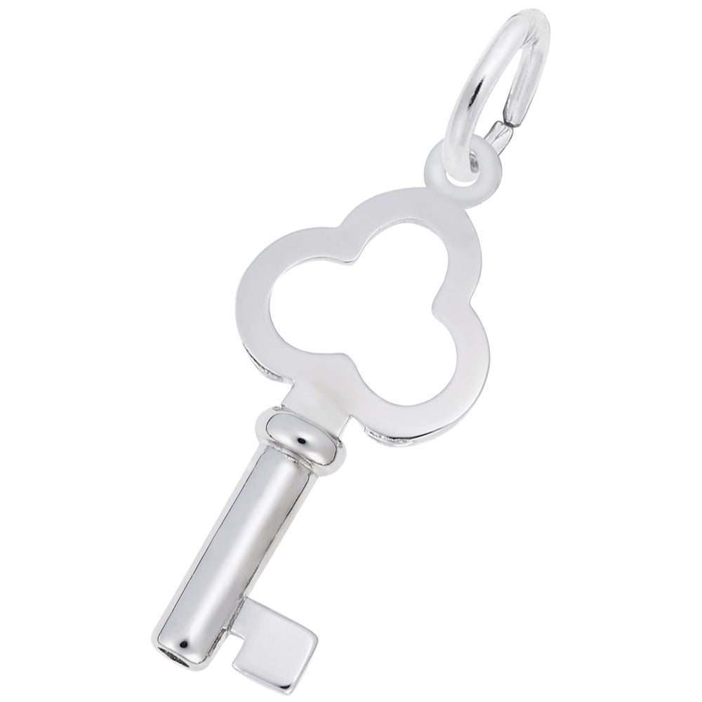 A Silver key shaped charm on a white background