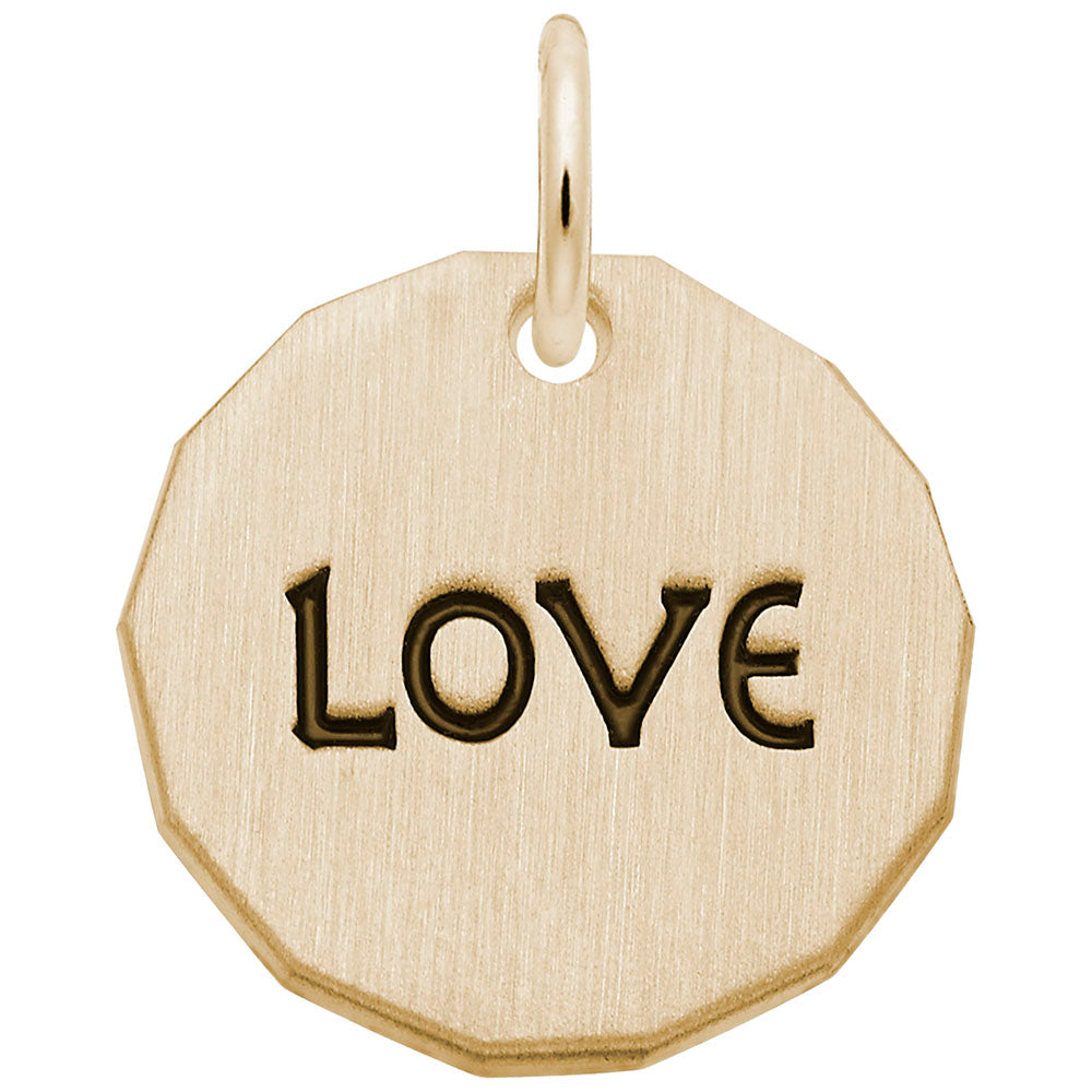 Gold disc charm with 'LOVE' engraved on a white background