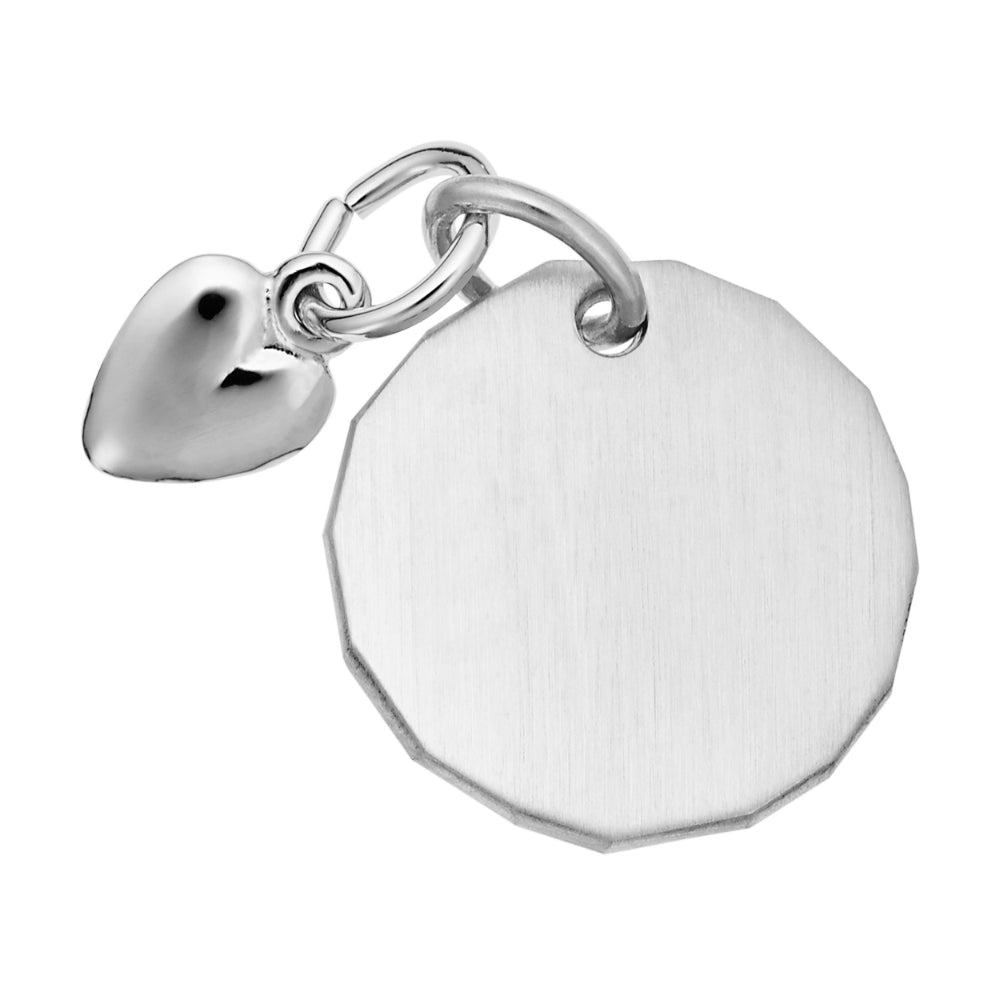 Plain silver disc pendant with a heart accent on a white background