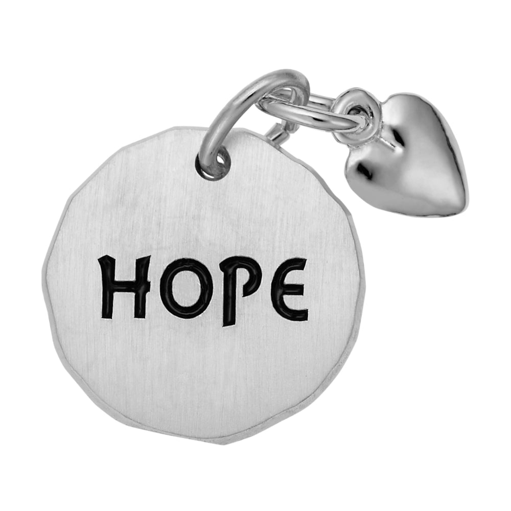 Silver disc charm with 'HOPE' engraving and a heart shaped bangle on a white background