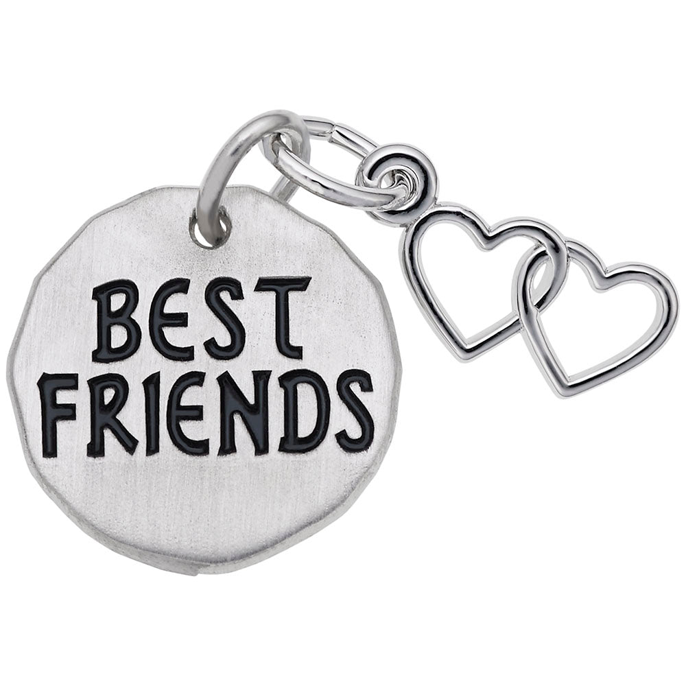 Silver disc charm with 'BEST FRIENDS' text and extra heart shaped charms on a white background