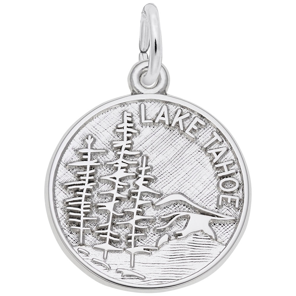 Silver disc charm engraved with a mountain scene and 'Lake TAHOE' on  a white background
