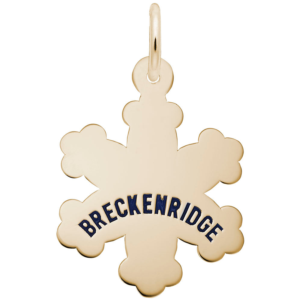 Gold snowflake charm engraved with 'BRECKENRIDGE' on a white background
