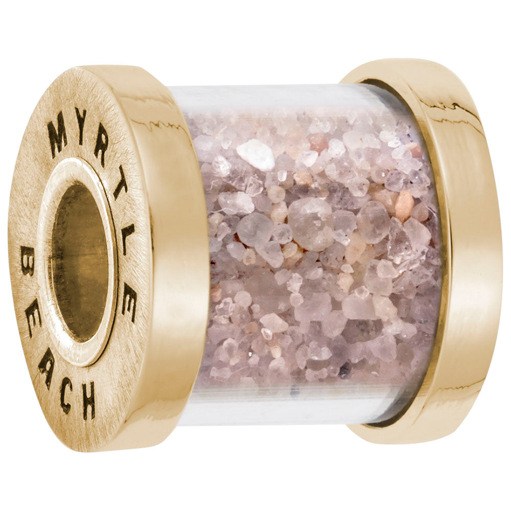 Bead capsule containing sand from Myrtle beach with gold ends with 'MYRTLE BEACH' engraved on it on a  white background