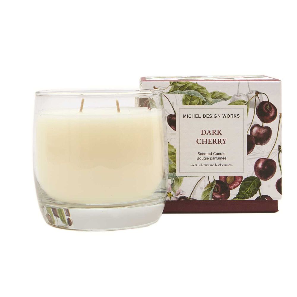 Glass candle with 'Dark Cherry' packaging on a white background