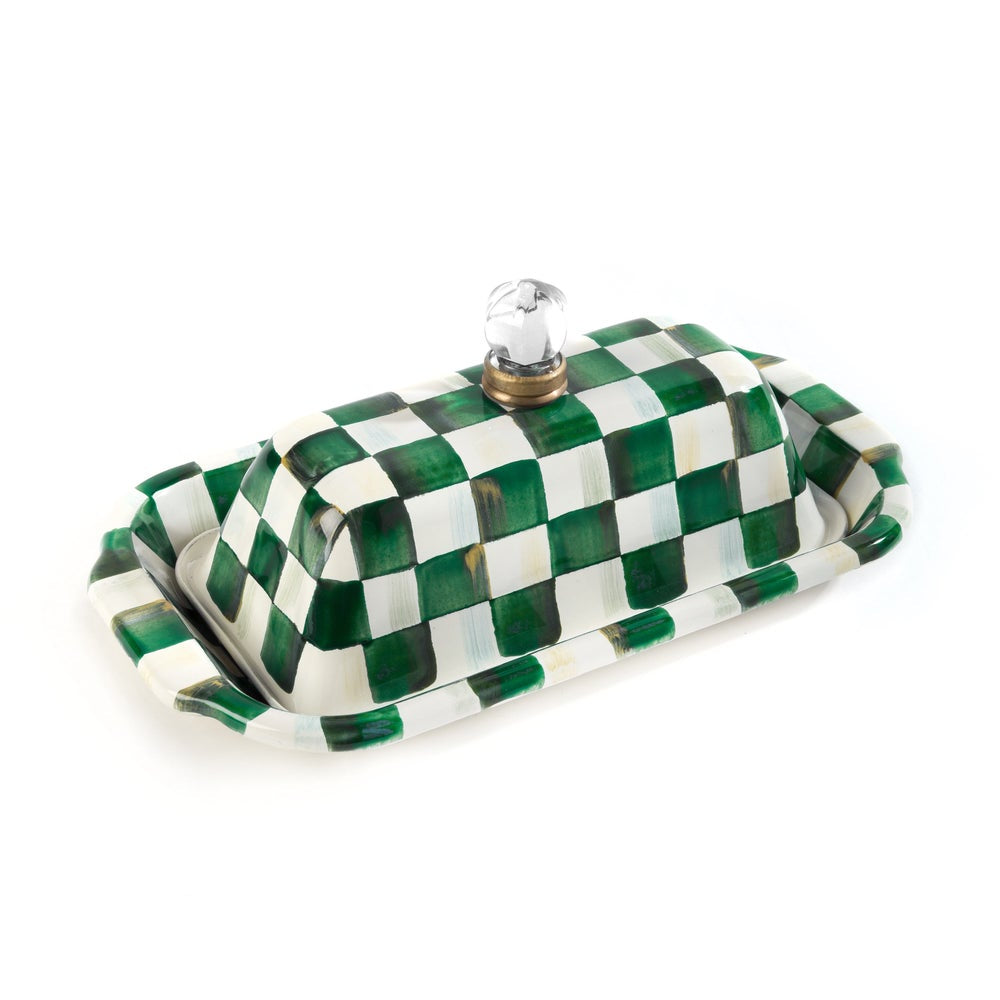 Green and white checkered butter dish on a white background