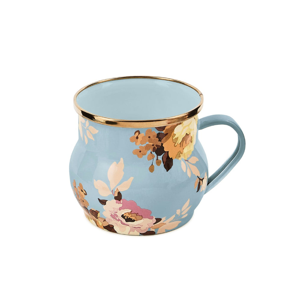 Decorative mug with floral design on a light blue background