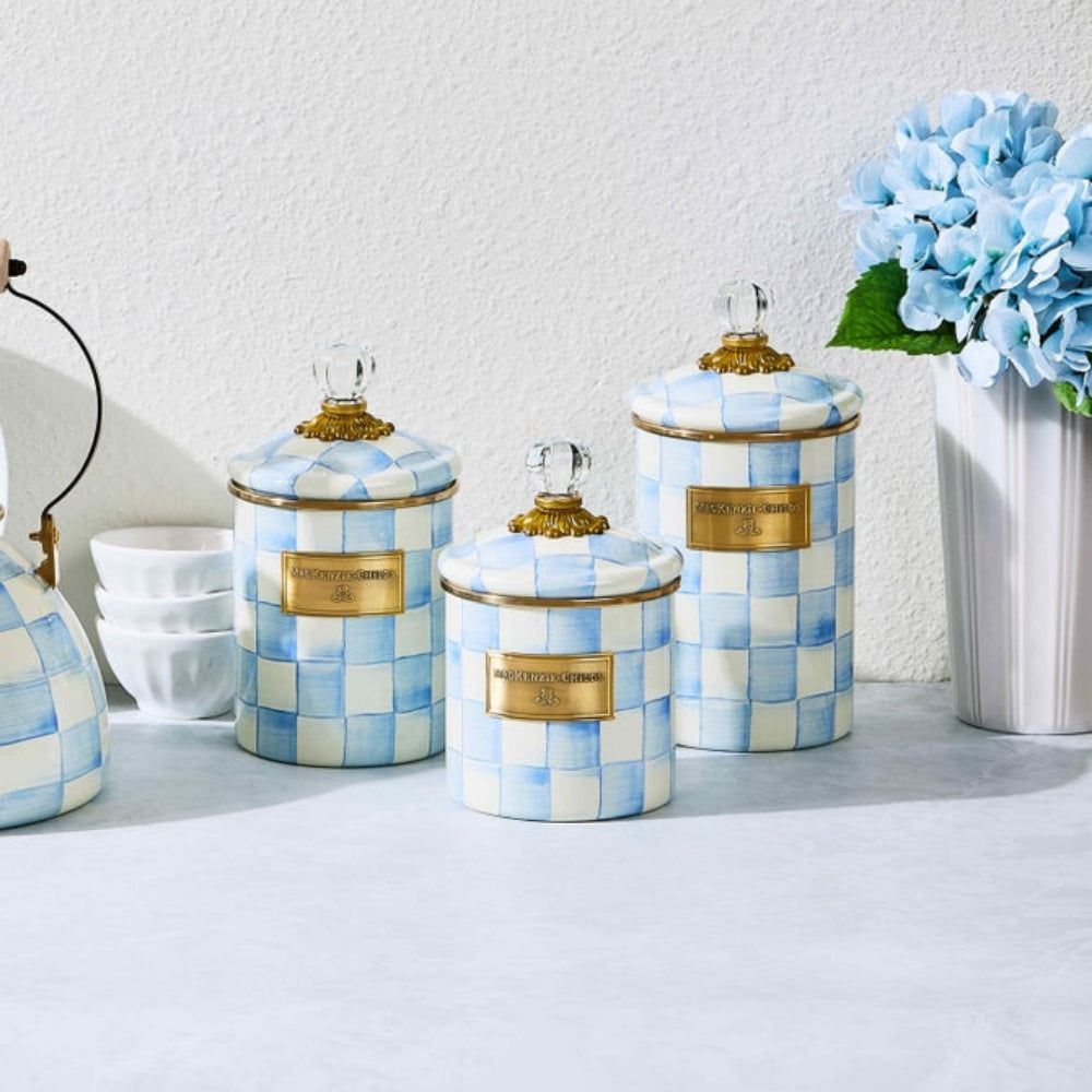 Set of decorative Sky Check Canisters  with blue and white checkered pattern on a light surface.