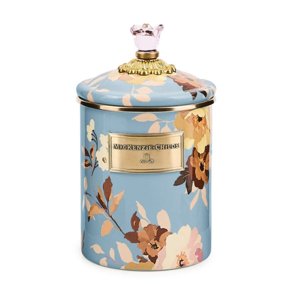 Decorative jar with floral design and gold accents on a white background