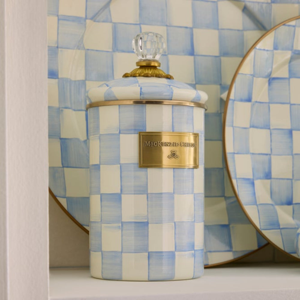 Decorative Large Sky Check canister with checkered pattern and gold accents on a blue and white checkered background with Sky Check plates. 