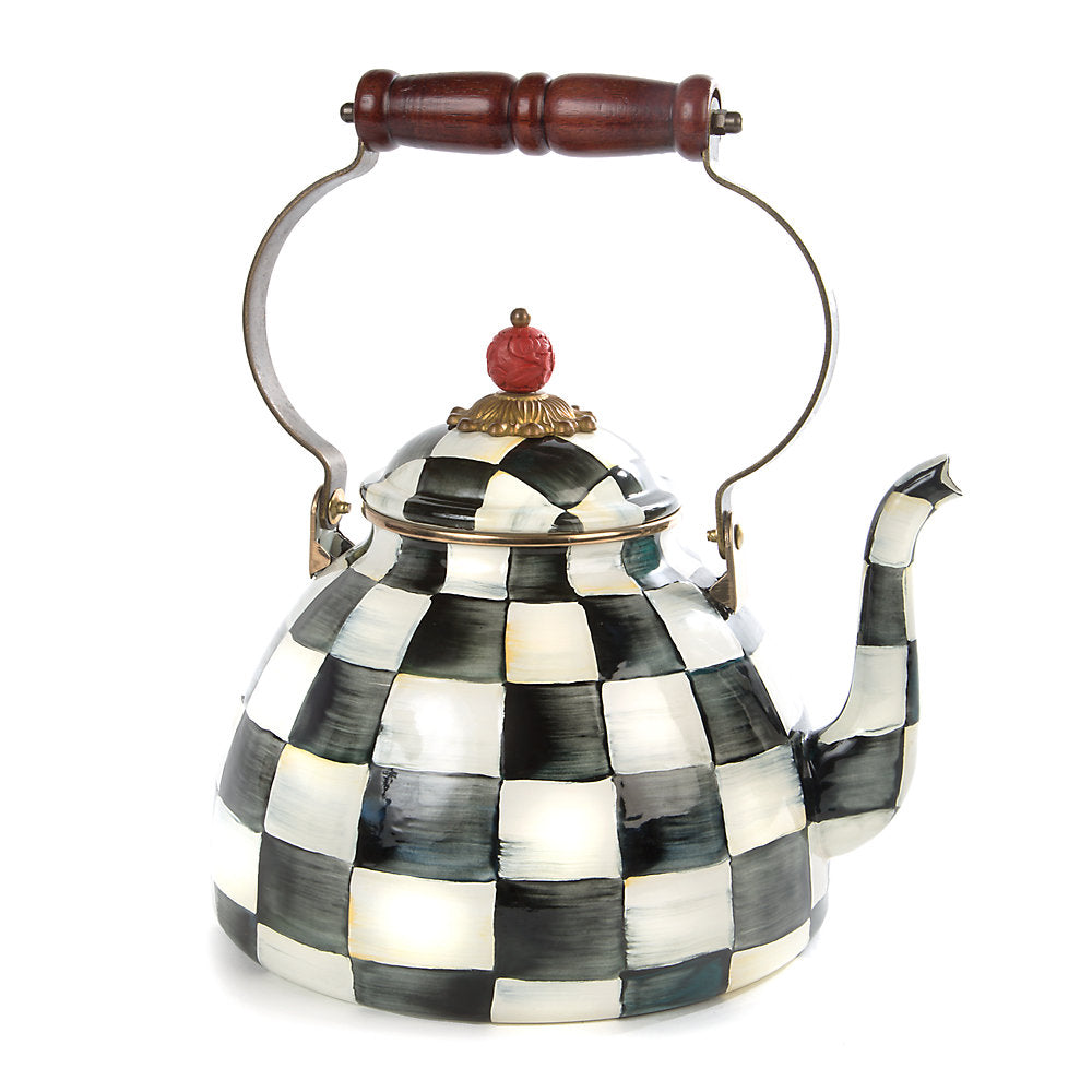 Decorative teapot with black and white checkered pattern with a handle on a white background.