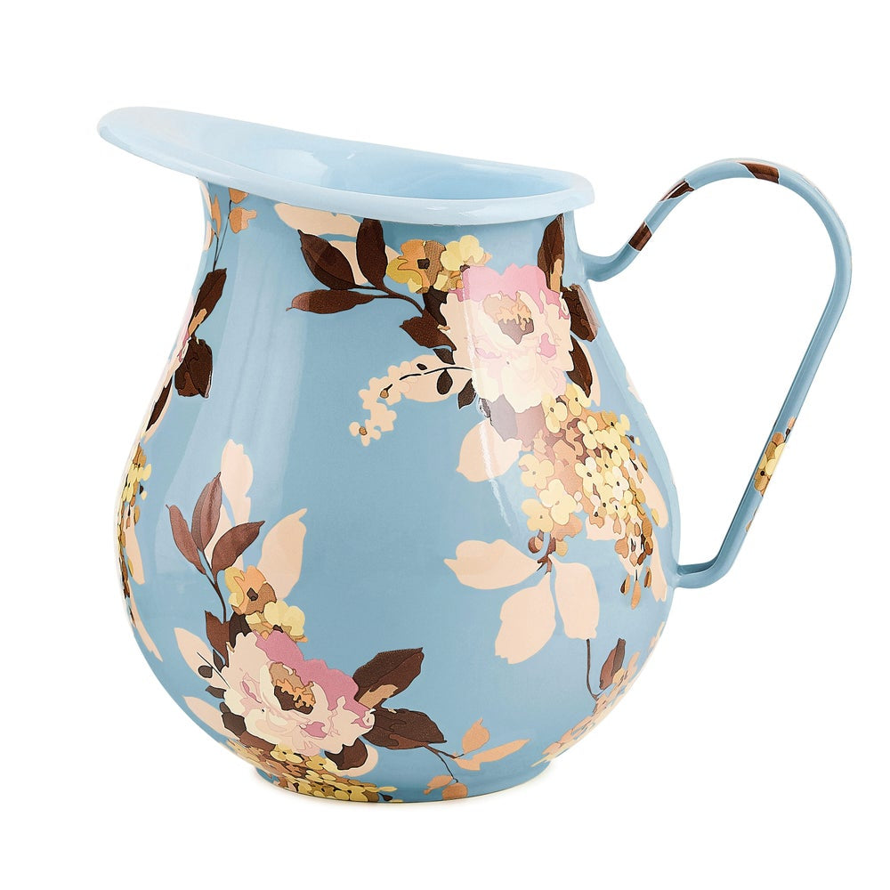 Floral-patterned ceramic pitcher on a white background