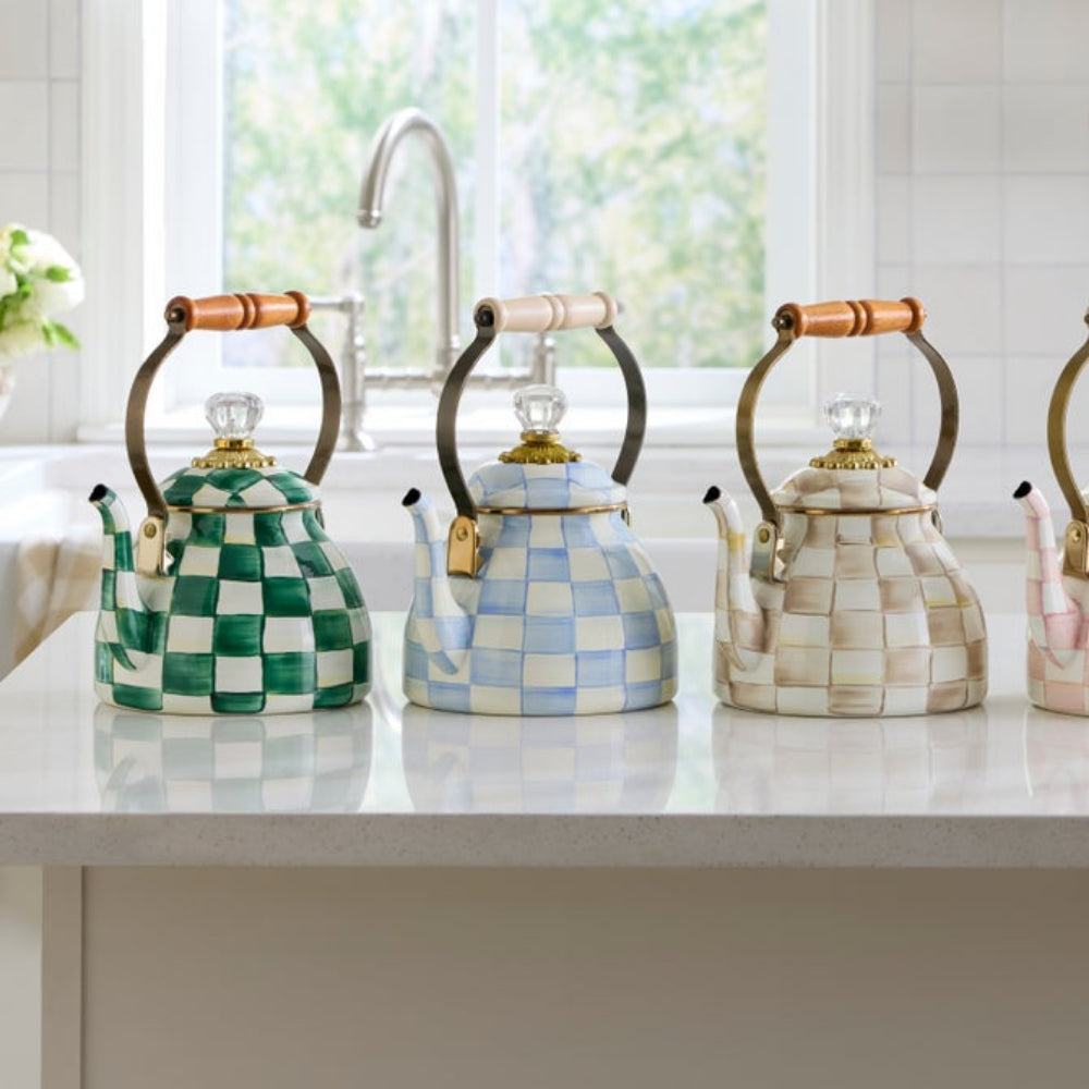 Three tea kettles on kitchen display (Emerald check, Sky check, and Mocha check.)