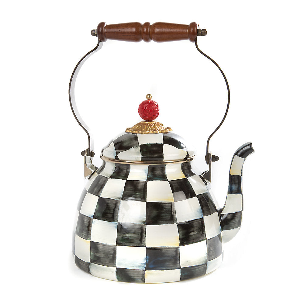 Decorative teapot with black and white checkered pattern with a handle on a white background.