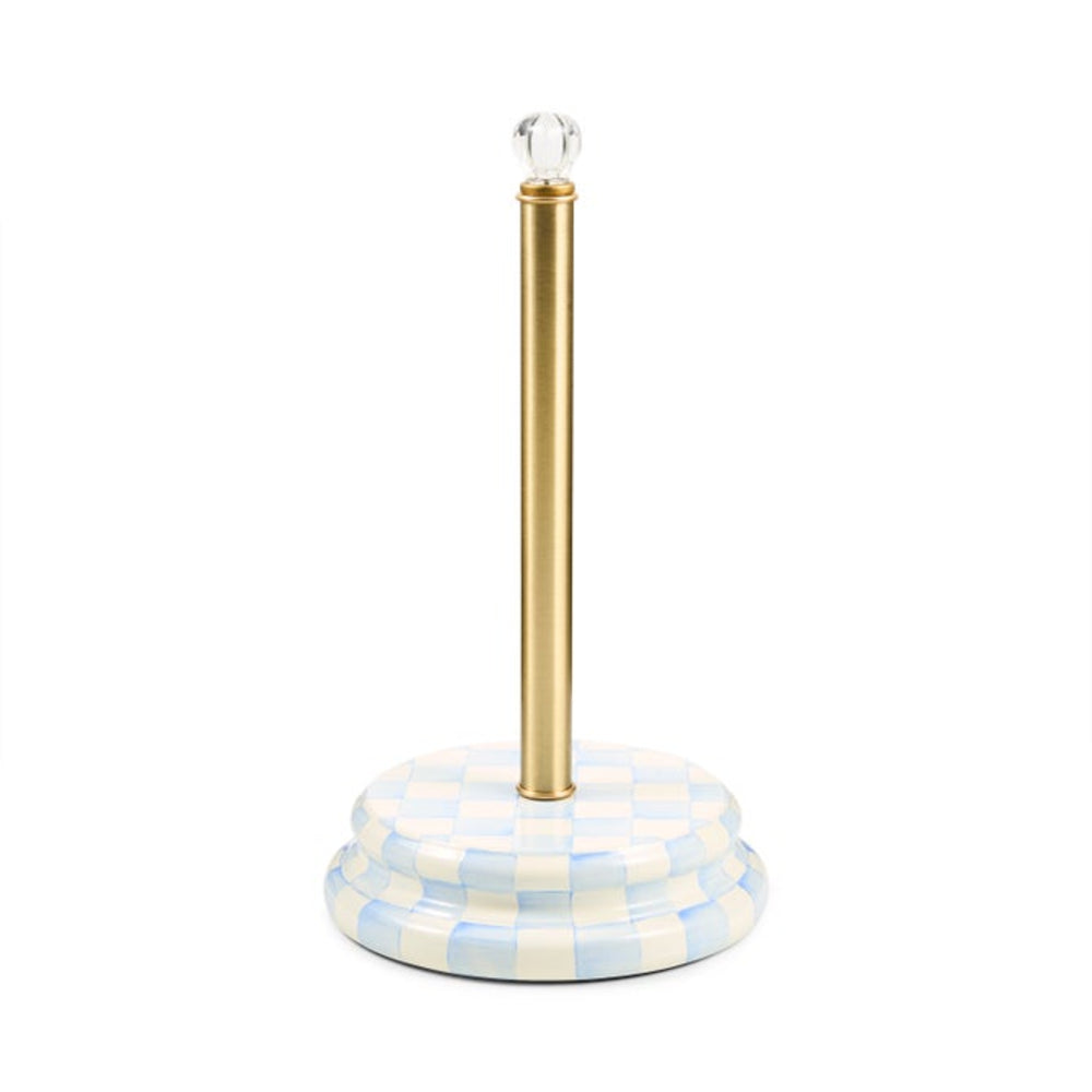 A decorative paper towel bar with a light blue and white checkered base, a polished gold vertical pole, and a clear glass sphere finial on top, shown against a plain white background.