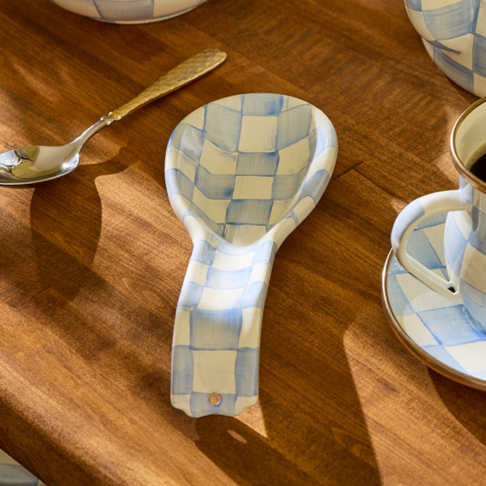 Sky Check Spoon rest with blue checkered pattern on a wooden surface