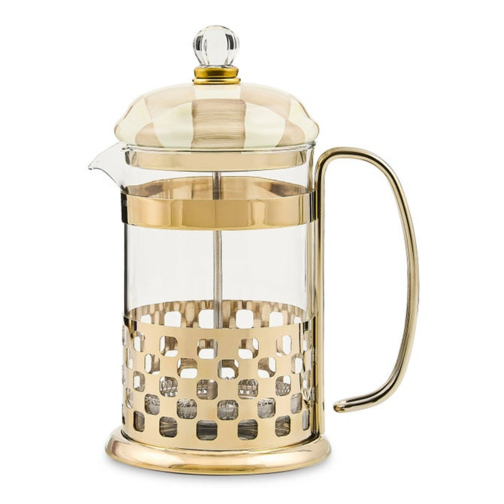 Gold French press coffee maker on a white background