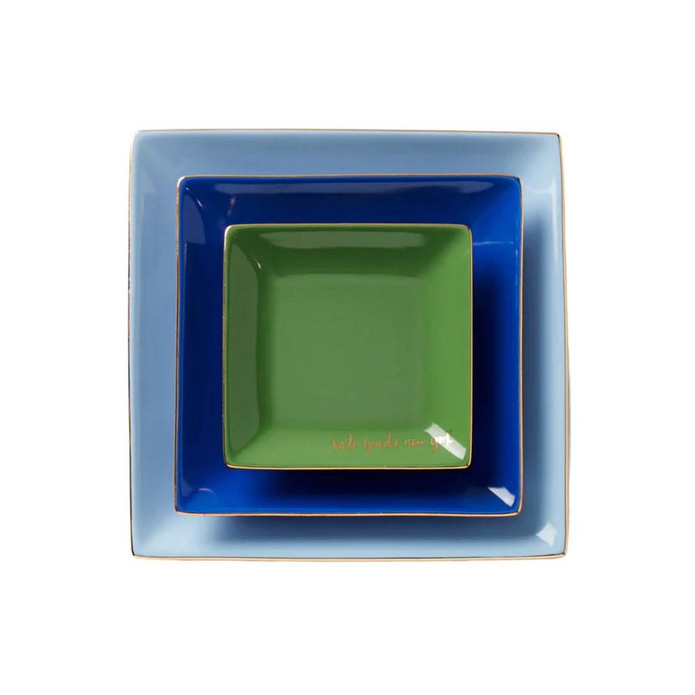 Stacked Kate Spade Make It Pop Cool Blue 3-Piece Tray Set on a white backround.