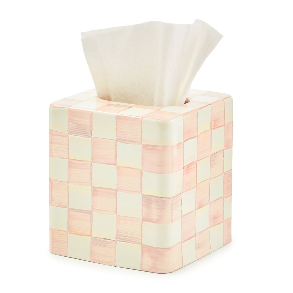 Tissue box cover with a checkered pattern in pastel colors on a white background