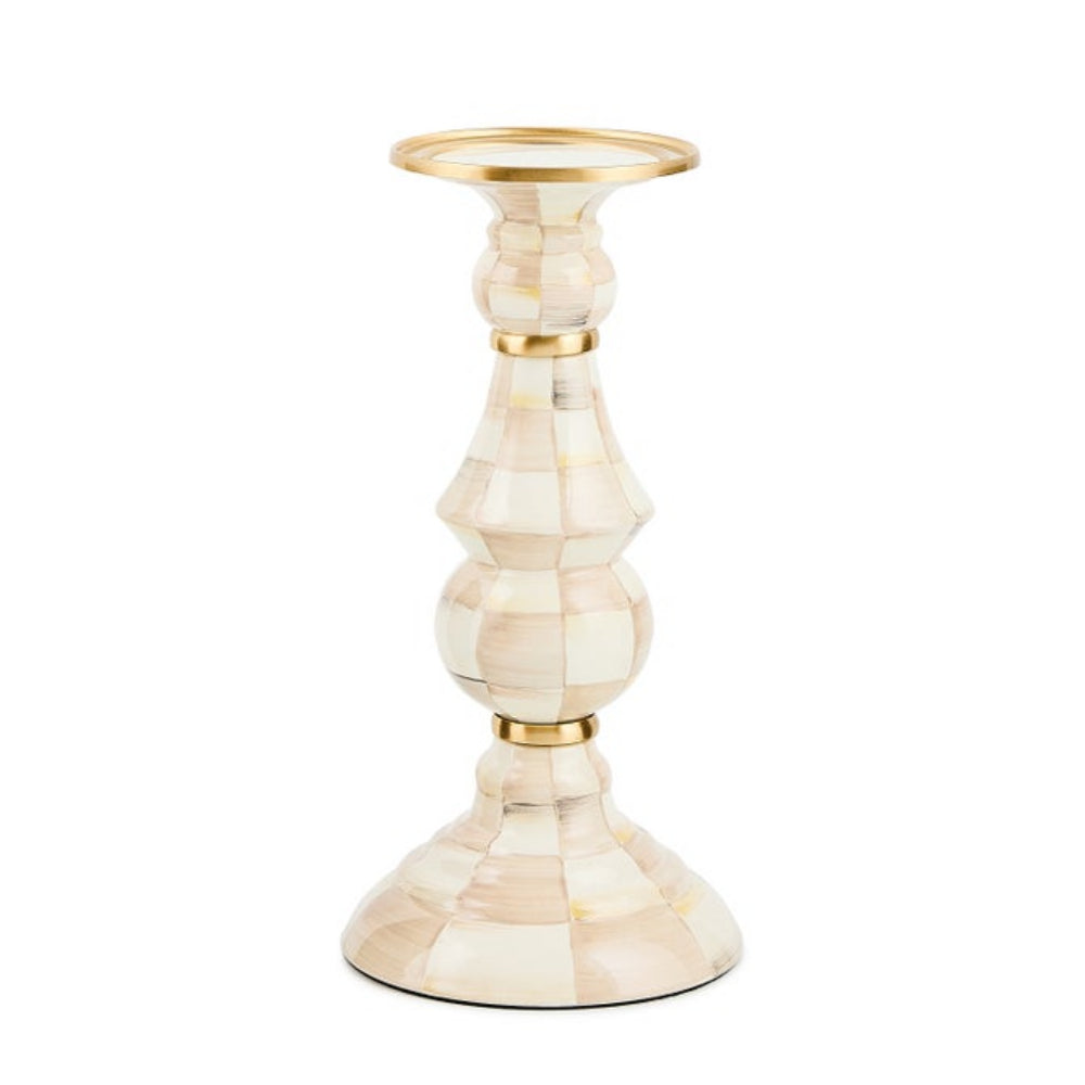 A decorative table candlestick holder made of cream and beige bone inlay panels with polished gold-tone metal trim at the top and between sections, shown on a plain white background.