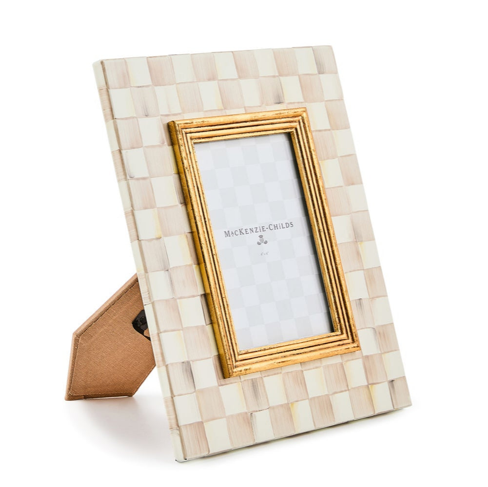 Decorative picture frame with mosaic design and gold accents on a white background (angle)