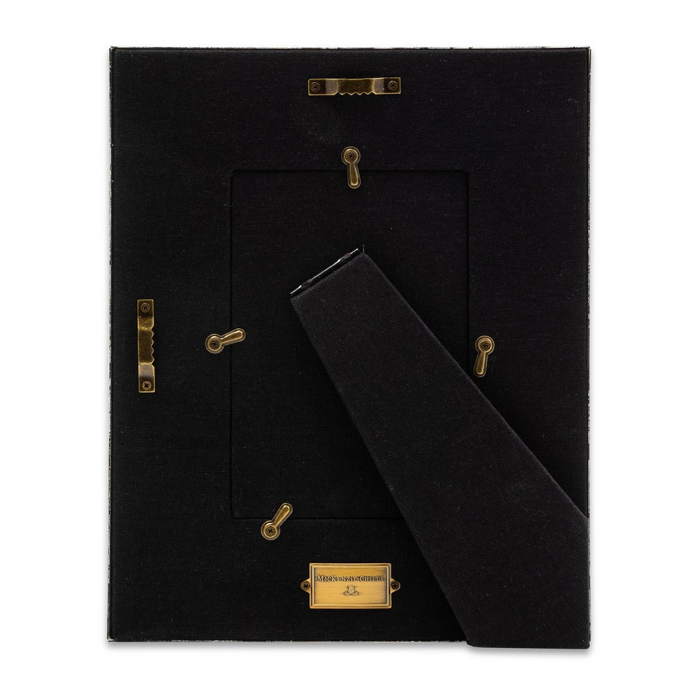 Black leather wallet with gold hardware on a white background