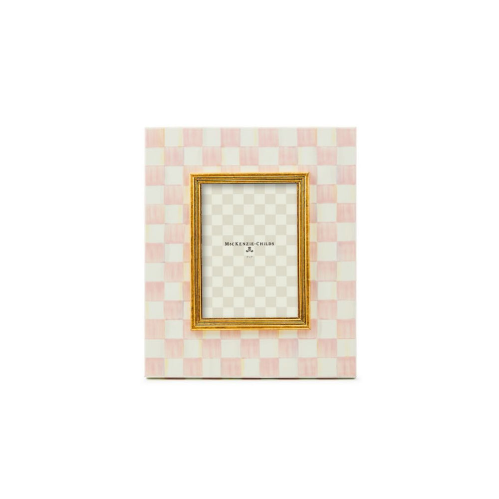 Hand-painted Rosy Check pattern picture frame with a brass logo plate, backed with linen, displaying a photo.