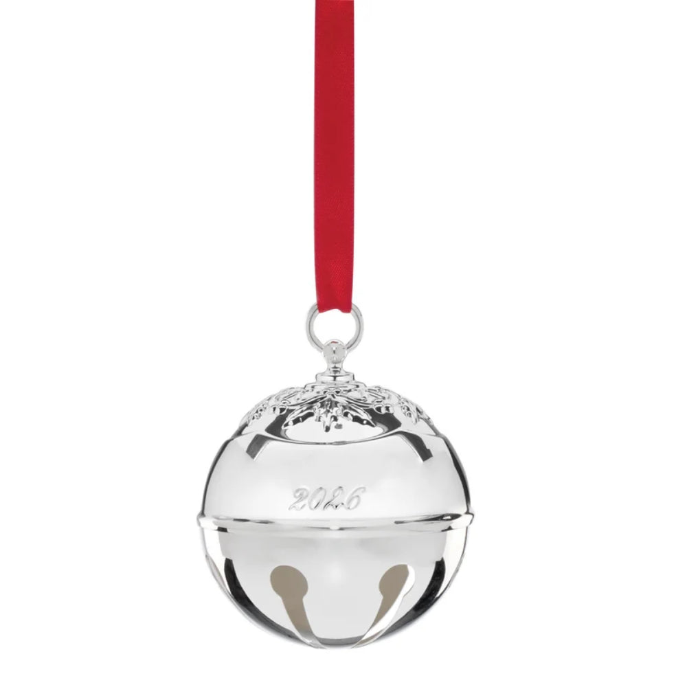 Reed & Barton silverplate bell ornament on a white background. 