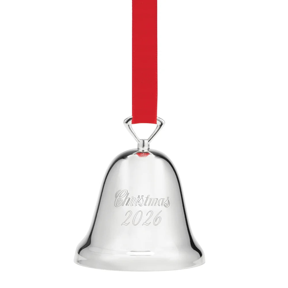 Silver bell ornament engraved with "Christmas 2026" with a red ribbon shown on a white background 