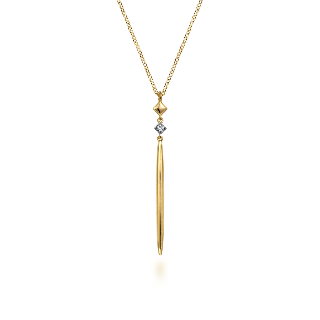 Gold necklace with a unique pendant on a white background