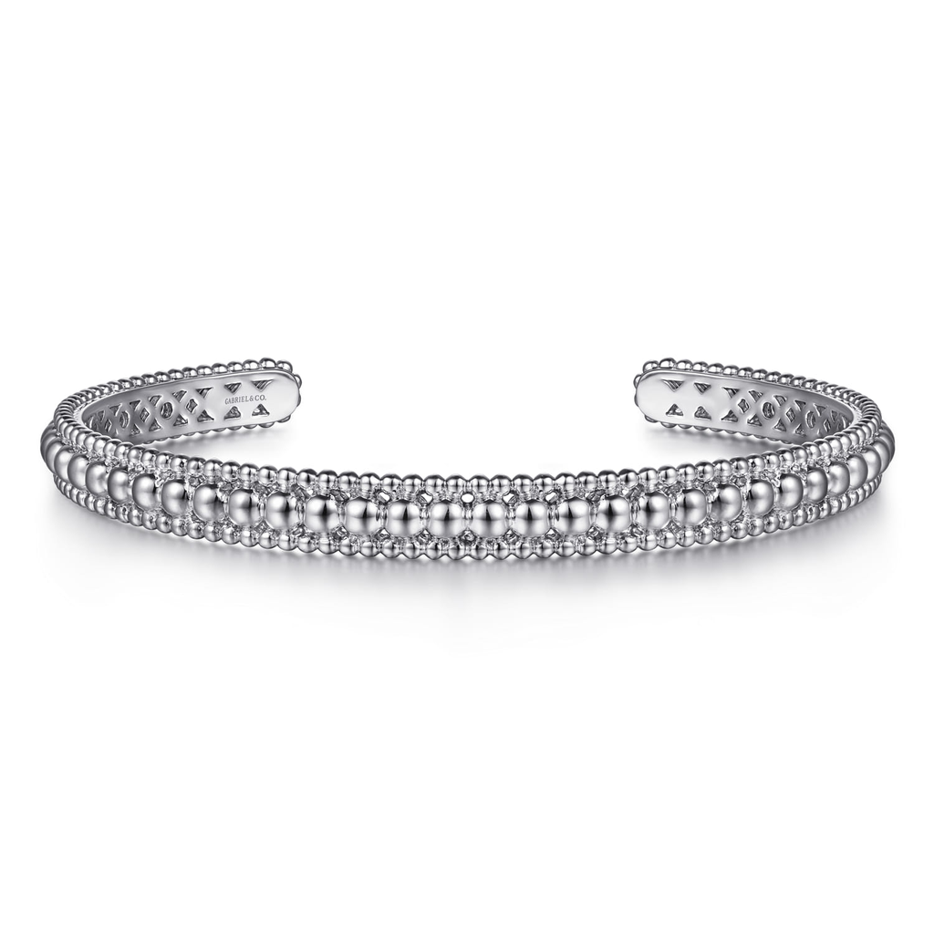 Silver beaded bracelet on a white background