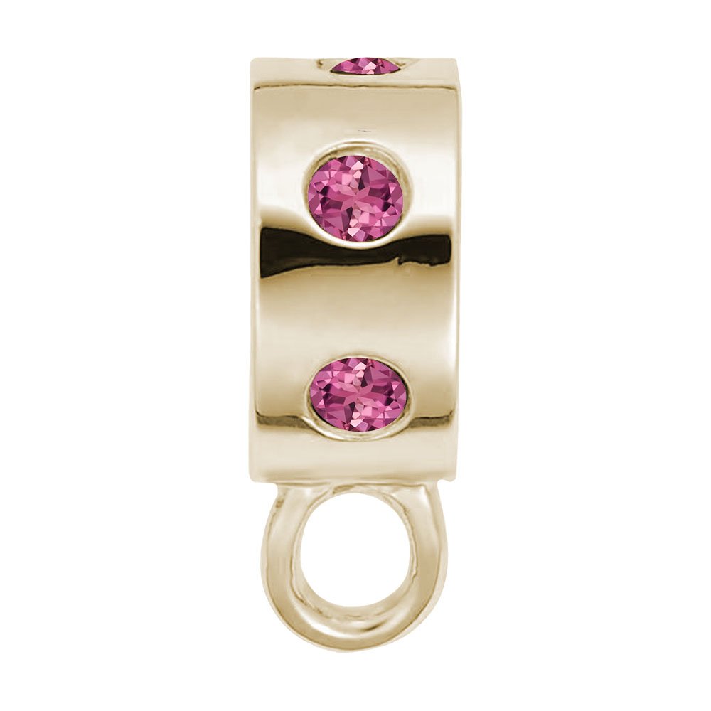 Gold charmdrop with pink stones on a white background
