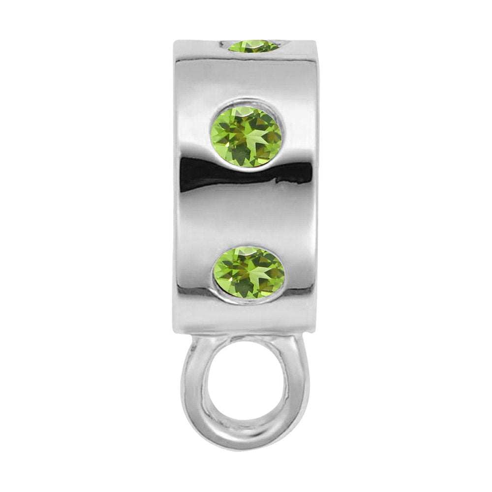 Silver charmdrop with green stones on a white background