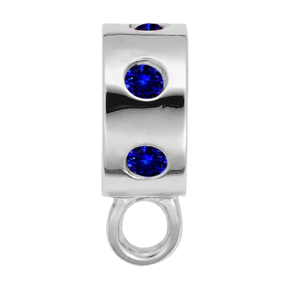 Silver charmdrop with blue stones on a white background