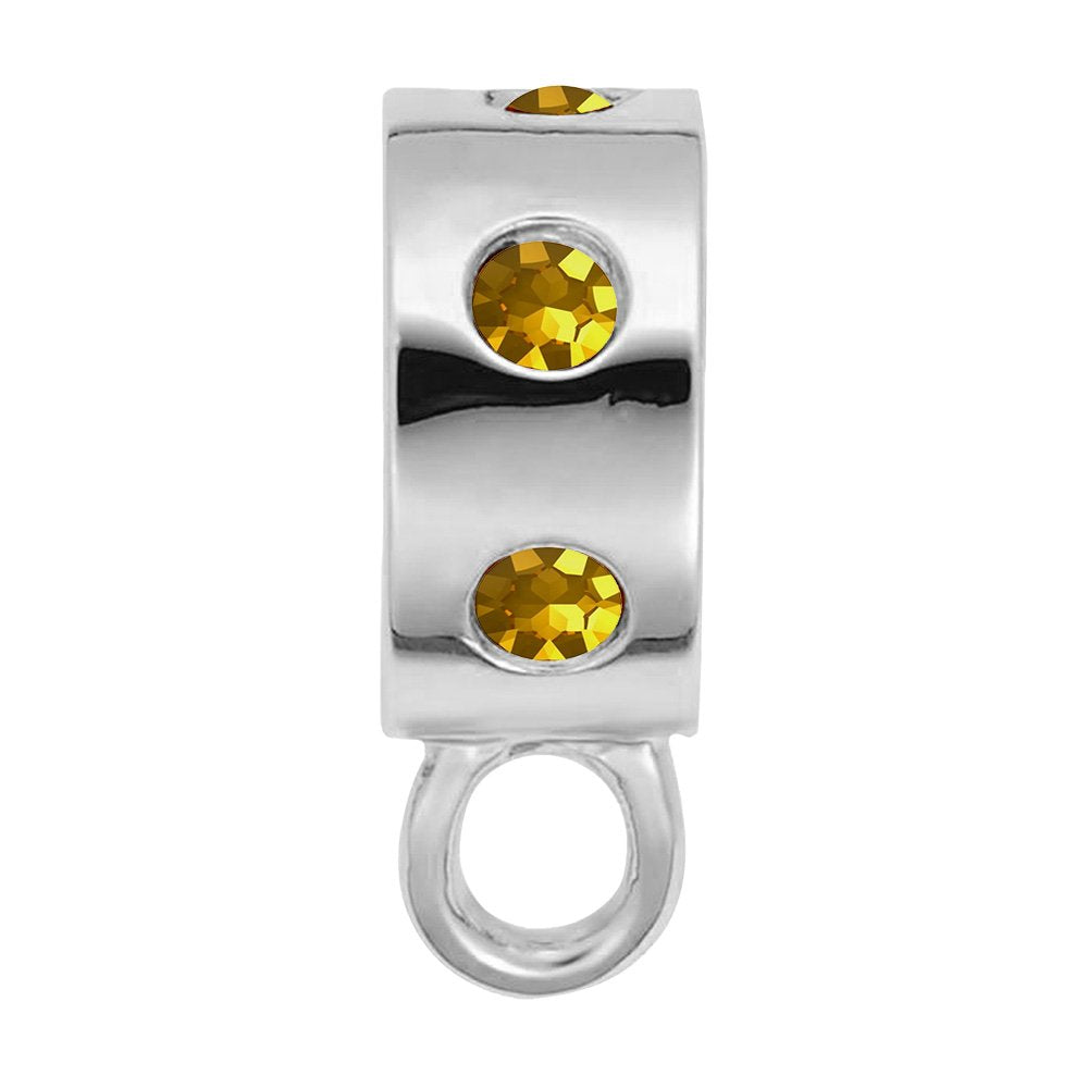 Silver charmdrop with orange stones on a white background